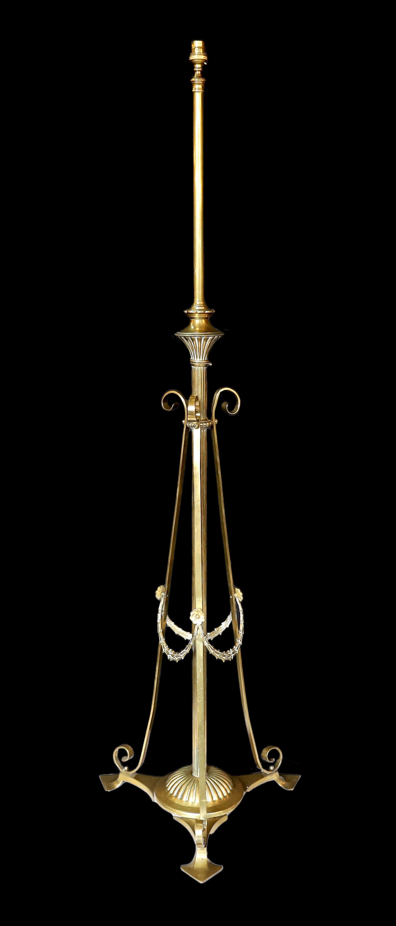 A late 19th century English brass telescopic lamp standard, height 146cm. width of base 43cm.